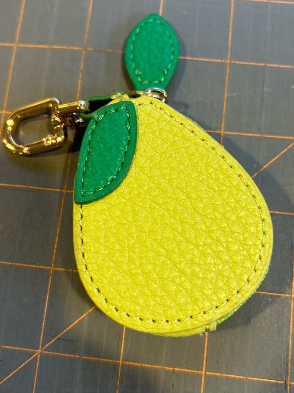 Lemon-Shaped Yellow Leather Keychain with Green Leaf Accent